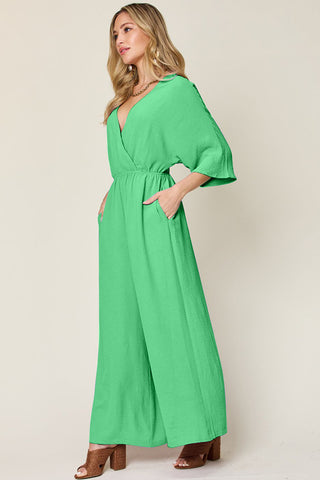 Double Take Full Size Surplice Wide Leg Jumpsuit with Pockets Trendsi