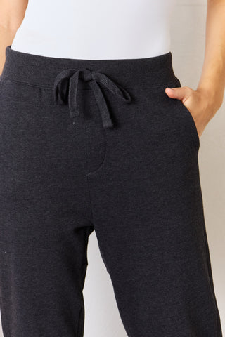 RISEN Soft Knit Drawstring Cropped Joggers Trendsi