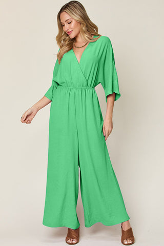 Double Take Full Size Surplice Wide Leg Jumpsuit with Pockets Trendsi