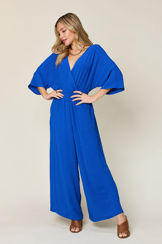 Double Take Full Size Surplice Wide Leg Jumpsuit with Pockets Trendsi