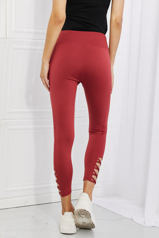 Yelete Ready For Action Full Size Ankle Cutout Active Leggings in Brick Red Trendsi