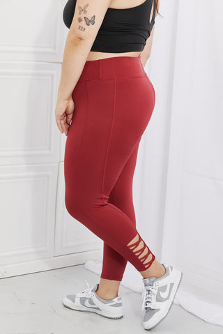 Yelete Ready For Action Full Size Ankle Cutout Active Leggings in Brick Red Trendsi