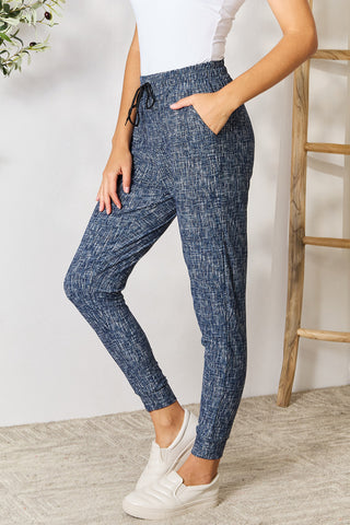 LOVEIT Heathered Drawstring Leggings with Pockets Trendsi