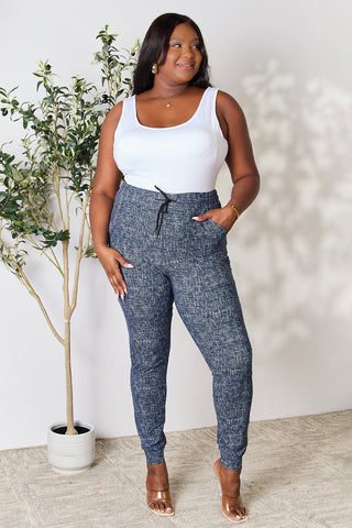 LOVEIT Heathered Drawstring Leggings with Pockets Trendsi