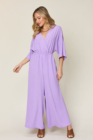 Double Take Full Size Surplice Wide Leg Jumpsuit with Pockets Trendsi