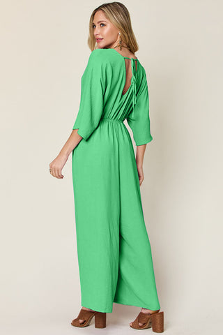 Double Take Full Size Surplice Wide Leg Jumpsuit with Pockets Trendsi