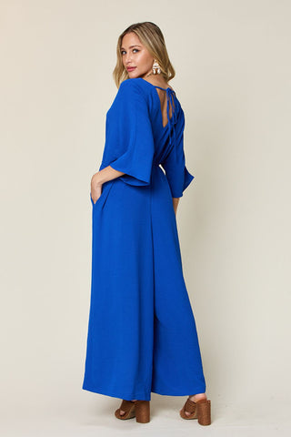 Double Take Full Size Surplice Wide Leg Jumpsuit with Pockets Trendsi